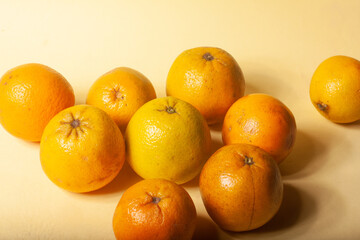oranges on a yellow background