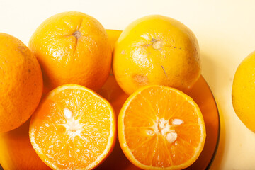 oranges on a yellow background