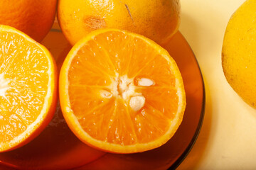 oranges on a yellow background