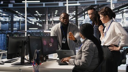 Angry technicians in server room fighting each other after encountering critical error popup during maintenance. Engineers having tense conversation, doing system recovery brainstorming chat, camera A