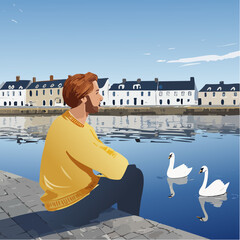 Person sitting on harbour wall looking across River Corrib towards Long Walk in Claddagh, Galway