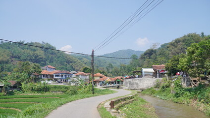 Naklejka premium the atmosphere in the village where there are rivers and roads