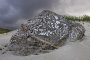 Rope Wrapped around a Rock on Traigh Mheilein Beach, Isle of Harris, Scotland