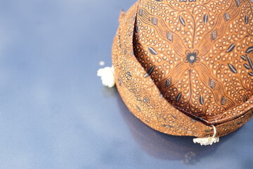 Close-up of a traditional Javanese cap with intricate patterns, showcasing cultural heritage
