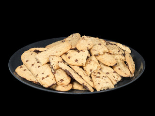 Chocolate-Dipped Cookies on a Dark Plate Against a Black Background