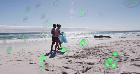 Collecting volunteers carrying blue trash bag and picking litter on sandy beach, floating eco icons