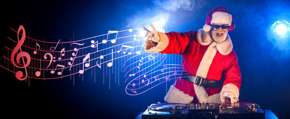Cool Santa DJ playing music in club