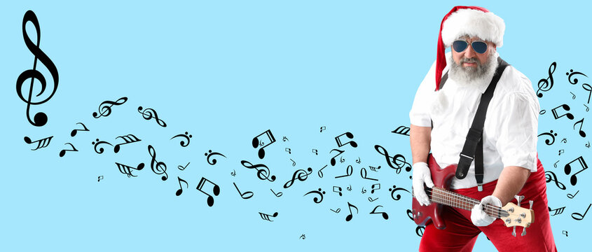 Cool Santa Claus playing guitar on blue background - Powered by Adobe
