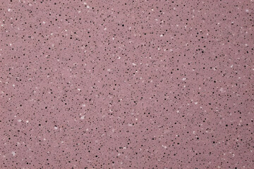 Duo of contrasting abstract stone textures: luxurious grey and gold flowing marble, and uniform pink quartz or granite composite with fine black and white speckles, ideal for backgrounds.