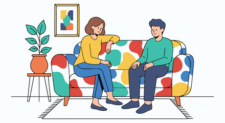 Couple discussing matters while sitting on a colorful sofa