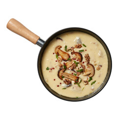 Small saucepan with handle filled with cream of mushroom soup cut out isolated transparent background