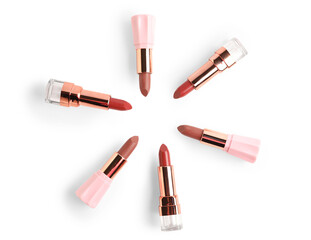 Obraz premium Frame made of different lipsticks on white background