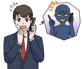 詐欺電話の対応をする男子学生