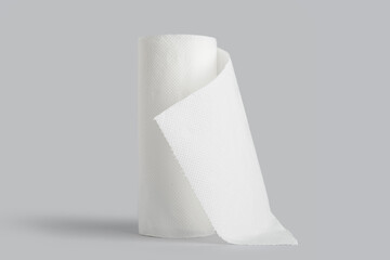 Roll of paper towels on grey background