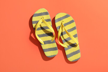 Striped flip-flops on red background