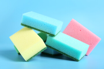 Sponges for cleaning on blue background