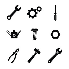Set of black and white silhouette icons of various tools, including wrench, gears, screwdriver
