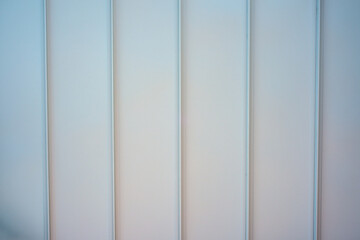 Sleek Light Blue Vertical Panel Wall Design