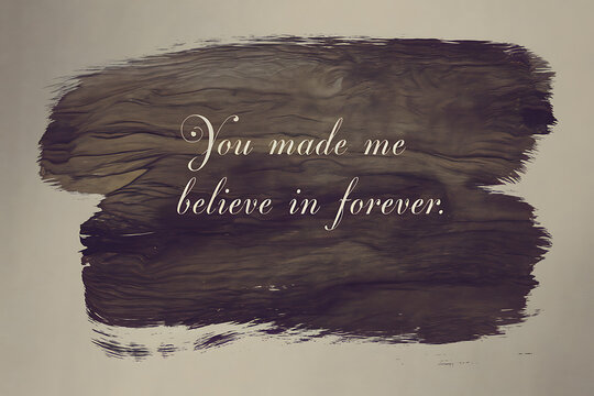 Beautiful handwritten calligraphy quote "she made me believe in forever" on textured background