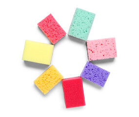 Frame made of cleaning sponges on white background