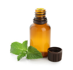 Bottle of fresh mint essential oil isolated on white background, closeup