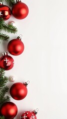A group of red Christmas ornaments on a white background.