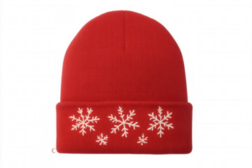 Red knit beanie featuring white snowflakes, representing winter fashion, festive holidays, and cold weather accessories