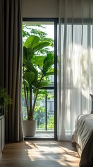 A bedroom with a bed and a plant in a pot
