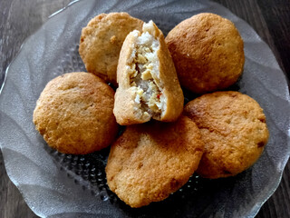 Combro is a popular traditional snack from the Sundanese culture in Indonesia. Made from cassava and filled with spicy oncom (fermented soybeans)