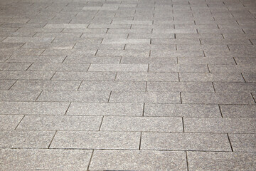 Close-up of a tiled street pavement
