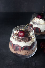 Black Forest Dessert Parfait on dark grey background.  