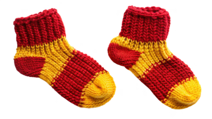 Two red and yellow knitted socks, isolated on transparent background