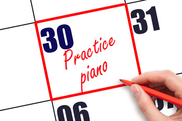30 th day of the month.  Hand writing Practice piano reminder and drawing red frame on calendar...