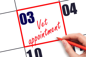3 rd day of the month.  Hand writing Vet appointment reminder and drawing red frame on calendar with red pen on white background. concept of caring for pets. Planning and scheduling