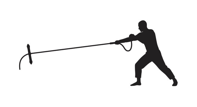 Silhouetted figure actively pulling a long implement with a hook and barred end demonstrating effort and strength isolated on white background