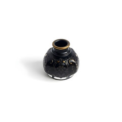 A delicate, antique ink pot with intricate engravings and a subtle sheen, placed centrally on a pristine white background
