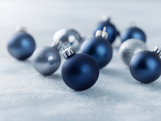 Navy blue bauble matte ornament glitter sphere silver bauble holiday decor winter background selective focus shallow depth festive mood soft light begin scene with frosty texture, calm tones