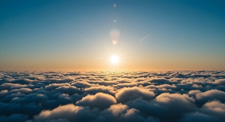 Sunrise Above Cloudscape, Clear Blue Sky, and Sunbeams