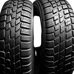 Two textured black tires showing intricate tread patterns