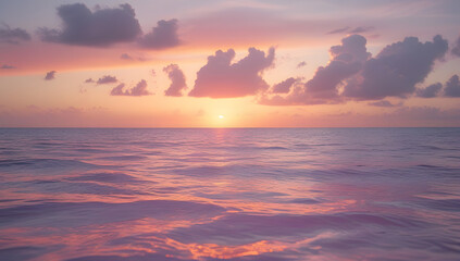 Sunset over the sea and ocean with colorful sky and clouds