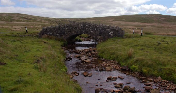 Wide Shot of the stonesdale bridge at west stones dale, on the pennines