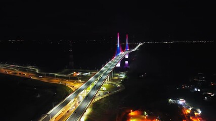 Illuminated Heroes of Chaco Bridge At Night In Paraguay, South America. Aerial Drone Shot