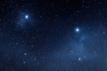 Obraz premium Cosmic scene showcasing a dark blue night sky filled with countless stars and a few bright celestial bodies