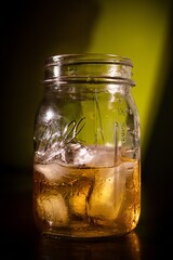 whiskey on the rocks in a mason jar 