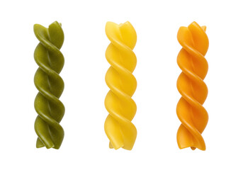 Colorful fusilli pasta isolated on transparent background PNG, green yellow and orange uncooked noodles for healthy eating and Italian cuisine