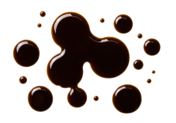 Dark brown balsamic vinegar drops isolated PNG, balsamic glaze spots on transparent background for food design and culinary use