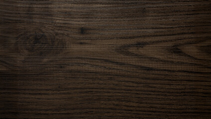 Dark brown wood texture with natural knots and grain pattern.