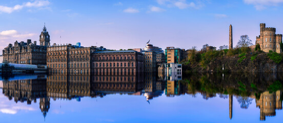 Edinburgh Calton Hill skyline with landmark medieval architectures, Gothic-style clock tower, and...