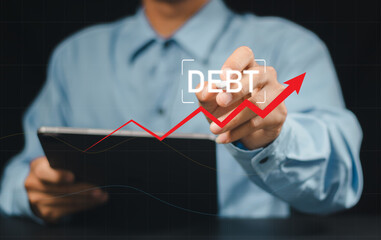 Debt growth on a virtual screen. The financier draws a rating for debt obligations. Concept - growth of public debt.