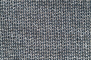 Houndstooth pattern wool fabric texture in brown and blue